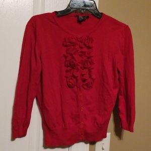 Red sweater with ruffle details